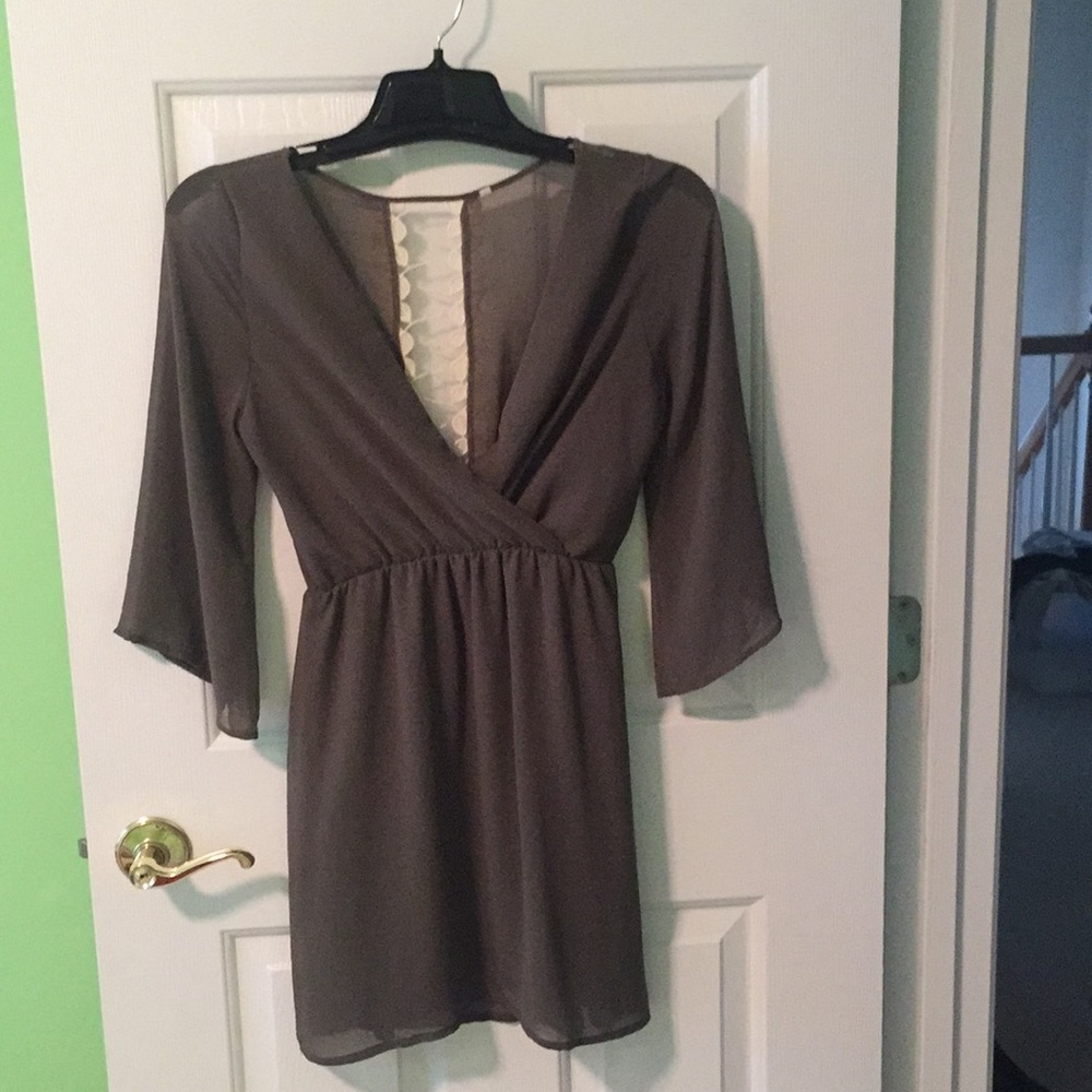 Super cute dress with lace detail in back